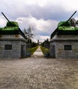 Old tanks standing on column at entrance to Soviet Officers Cemetery