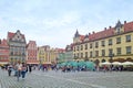 Wroclaw, Poland, June 15, 2022: tourists and locals walk along the old square in Wroclaw. Royalty Free Stock Photo