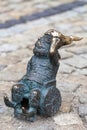 Wroclaw dwarf, small fairy-tale bronze figurine on the side walk, Wroclaw, Poland