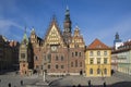 Wroclaw / POLAND - March 30, 2018: City hall with tower on main Wroclaw square, touristic season, sunny and blue sky Royalty Free Stock Photo