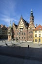 Wroclaw / POLAND - March 30, 2018: City hall with tower on main Wroclaw square, touristic season, sunny and blue sky Royalty Free Stock Photo
