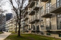 Lookup to facade of modern apartment building with big windows and balconies Royalty Free Stock Photo