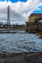 Redzinski weir over Odra river in front of Redzinski highway bridge at sunny cloudy day Royalty Free Stock Photo