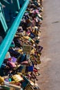 Wroclaw, Poland - March 9, 2108: Symbolic love padlocks fixed to the railings of grunwaldzki bridge, Wroclaw, Poland.