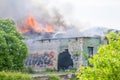 Firefighters, Fire brigade fighting fire in old abandoned building