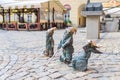 Wroclaw, Poland, May 7, 2019: three Dwarfs: deaf, blind with a stick and invalid in a wheelchair