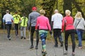 WROCLAW, POLAND - OCTOBER 15, 2017: People in fitness course nordic walking competition in the city park Royalty Free Stock Photo