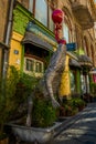 WROCLAW, POLAND: Sculpture of a crocodile with a ball. Beautiful building in the historic center of the old town