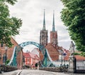 Wroclaw. Poland. View at Tumski island and Cathedral of St John the Baptist with bridge through river Odra Royalty Free Stock Photo