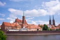Wroclaw Poland view at Tumski island and Cathedral of St John the Baptist with bridge through river Odra Royalty Free Stock Photo