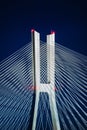 Wroclaw Redzinski Bridge over the Odra River, illuminated pylon and cable-stayed on the sky background Royalty Free Stock Photo