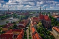 Wroclaw, town in Poland, sunny day in summer. Blue sky with white clouds. Uraban landscape, aerial picture above historical Royalty Free Stock Photo