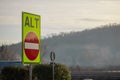 Wrong or one way signal on italian motorway with writing alt or stop. High visibility color of one way road on motorway Royalty Free Stock Photo