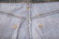 The wrong side, fabric of jeans denim close up, reverse and back side of clothes Royalty Free Stock Photo