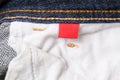 The wrong side, fabric of jeans denim pocket close up, reverse and back side of clothes Royalty Free Stock Photo