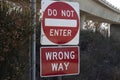 Wrong way do not enter sign on the side of the road Royalty Free Stock Photo