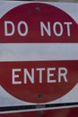 Wrong way do not enter sign on the side of the road Royalty Free Stock Photo