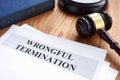 Wrongful termination. Documents and gavel