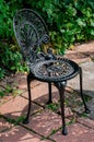 Wrought cast iron chair in the garden black color