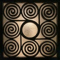 Wrought Greek iron grille made of spirals