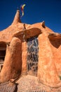 Wrought iron artisan door on clay house