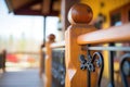 wrought iron bannister detail on log cabin balcony Royalty Free Stock Photo