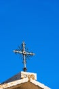 Wrought Iron Cross on Blue Sky Royalty Free Stock Photo