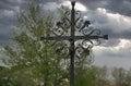 Wrought iron cross in a cemetery Royalty Free Stock Photo