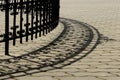 Wrought iron decorative fence and shadow