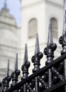 Wrought iron fence and Saint Louis Cathedral in New Orleans Royalty Free Stock Photo