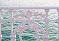 Wrought iron fence by the sea Royalty Free Stock Photo