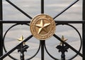 Wrought Iron Gate with Gold Stars Royalty Free Stock Photo