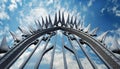 Wrought Iron Gate with Sharp Points on Blue Sky with Clouds - Generative Ai Royalty Free Stock Photo