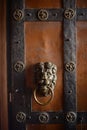 Wrought iron lion door handle.