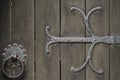 Wrought Iron metal work on ald wooden door Royalty Free Stock Photo