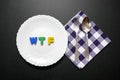 WTF slogan letters on plate with fork and knife