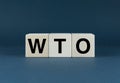 WTO - World Trade Organization. Cubes form the word WTO - World Trade Organization. Business Word Concept