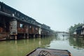 WUZHEN,CHINA-MARCH 6,2012: Ancient buildings along the canal. View from the water