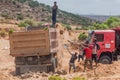 WUKRO, ETHIOPIA - MARCH 22, 2019: Local people loading sand into a truck near Wukro, Ethiop
