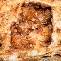 Wulfenite crystals in geode close up