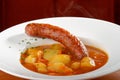 Wurst goulash soup with meat sausage and potatoes