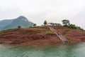 Ferry passengers sitting on steps along Dicui gorge, Wushan, China