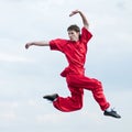 Wushoo man in red practice martial art