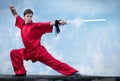 Wushoo man in red practice martial art Royalty Free Stock Photo