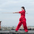 Wushoo man in red practice martial art