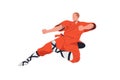 Wushu fighter. Chinese kung-fu, traditional martial art. Asian wrestler kicking in fight pose, attacking stance, action