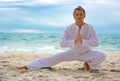 Wushu man on the beach Royalty Free Stock Photo