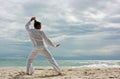 Wushu man on the beach