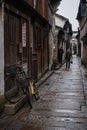 Locals and bicycles in the old streets of Wuzhen