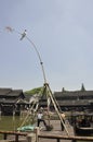 Wuzhen, 4th may: Acrobatics on flexible bar from the Historic museum Town Wuzhen Dongzha